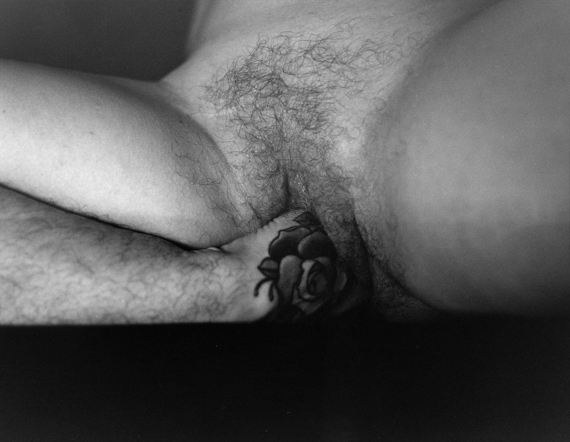 Hypermobile. Foot inside her own body. Rose tattoo on the top of her foot.